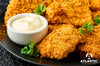 Trozos de pollo apanado con mayonesa kraft